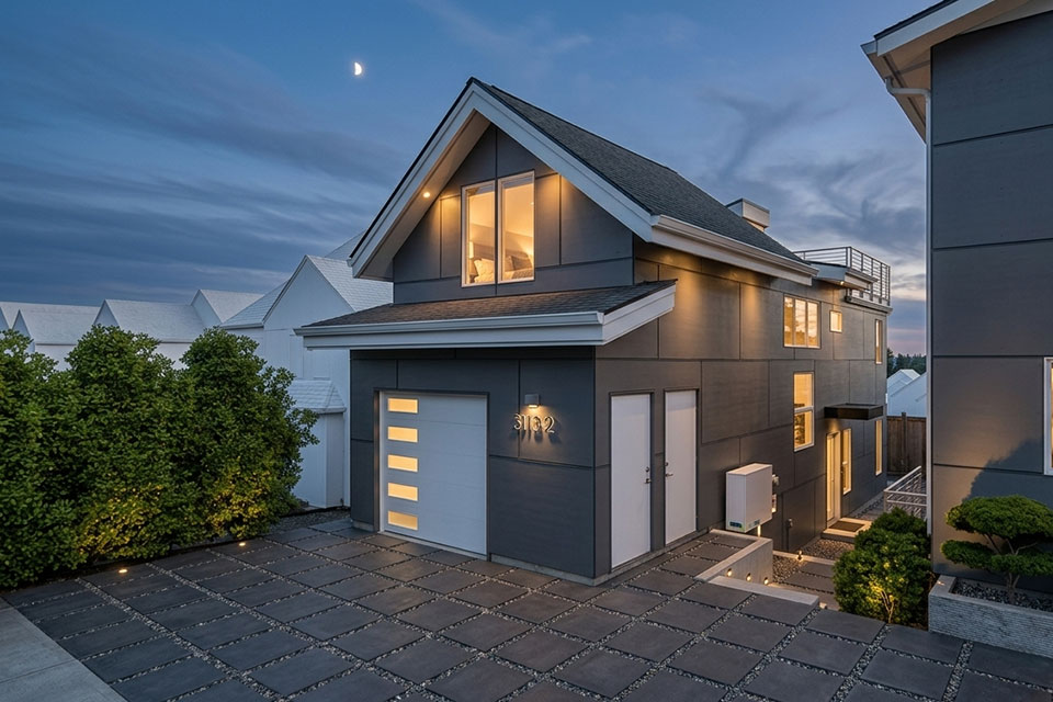 A contemporary DADU picking up elements of the existing residential Seattle neighborhood consisting of a mix of new construction PNW modern and mid-century bungalows.